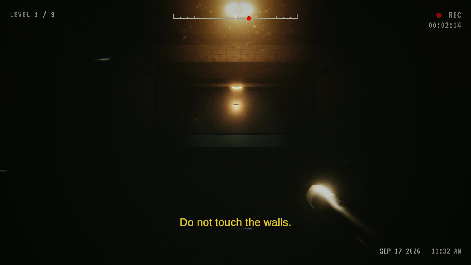 A corridor with the subtitle do not touch the walls